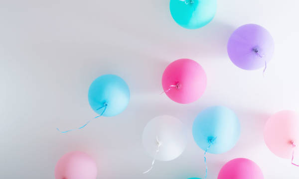 balloons on white wooden background