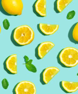 Fresh lemon pattern on a bright color background flat lay